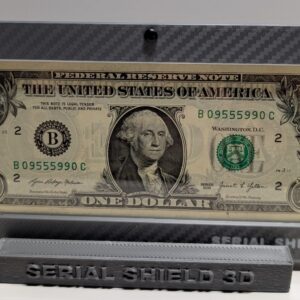 Gray carbon fiber Serial Shield 3D currency frame with stand and 7 mil Mylar window