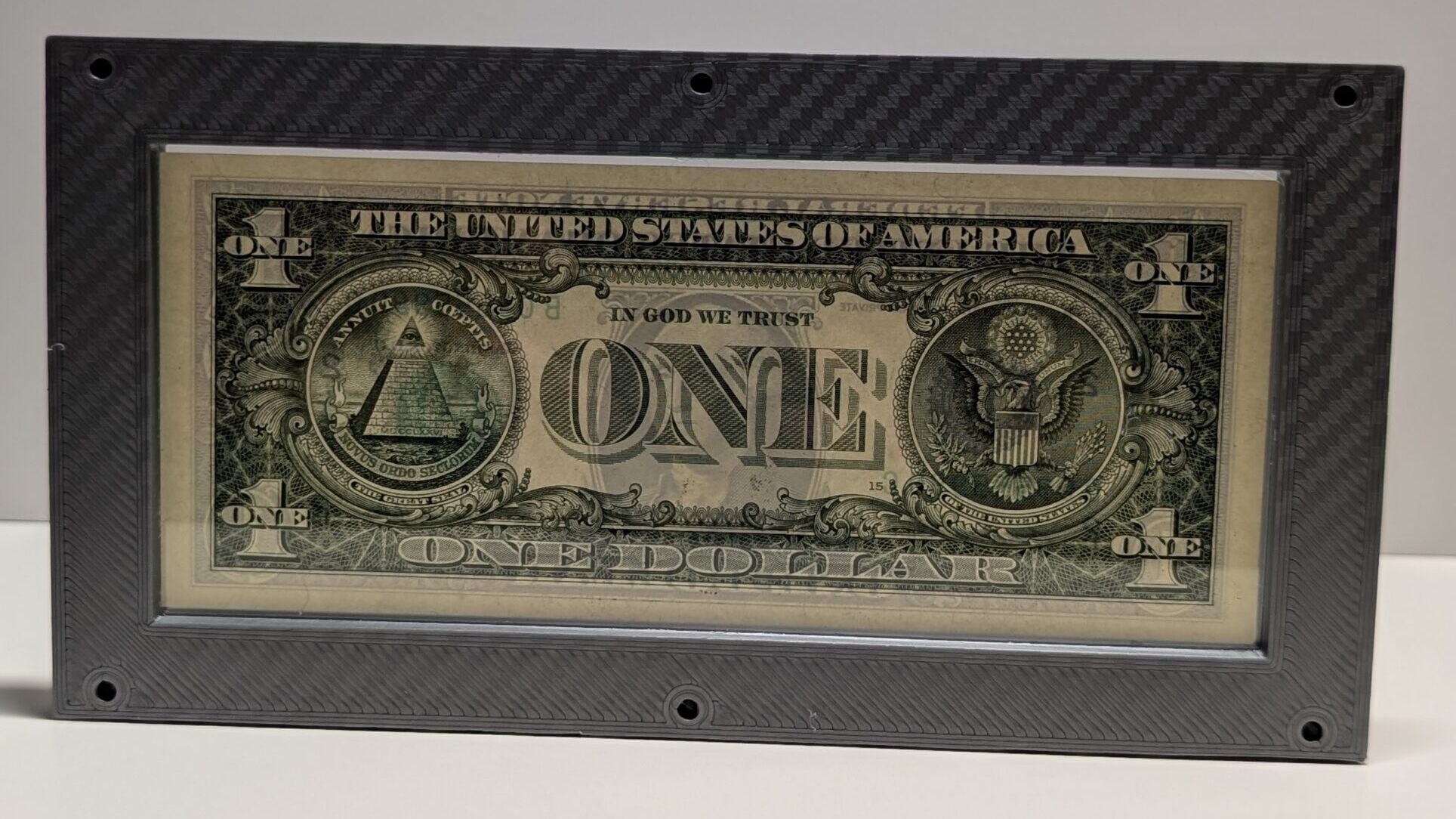 Gray carbon fiber Serial Shield 3D currency frame with stand and 7 mil Mylar window